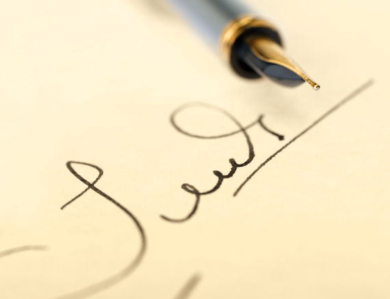 Image of signature and pen